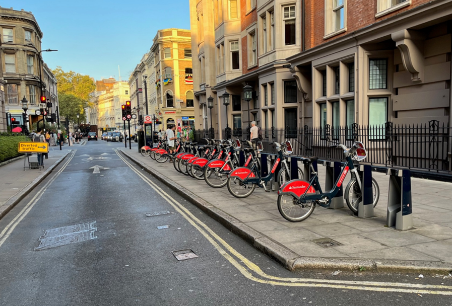 Santander hire bike station which is on the pavement