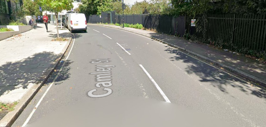 curved area of road with parking on one side