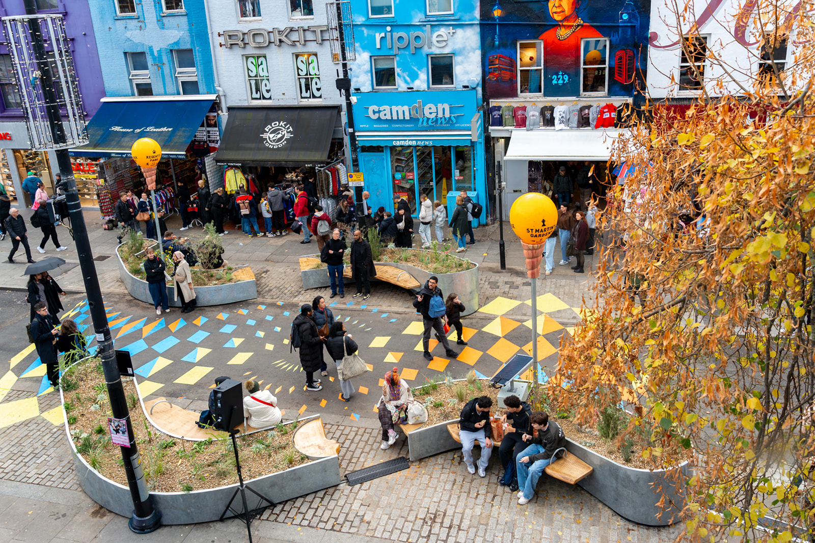 Camden high street seen from above with new furniture and plants where once there was a road