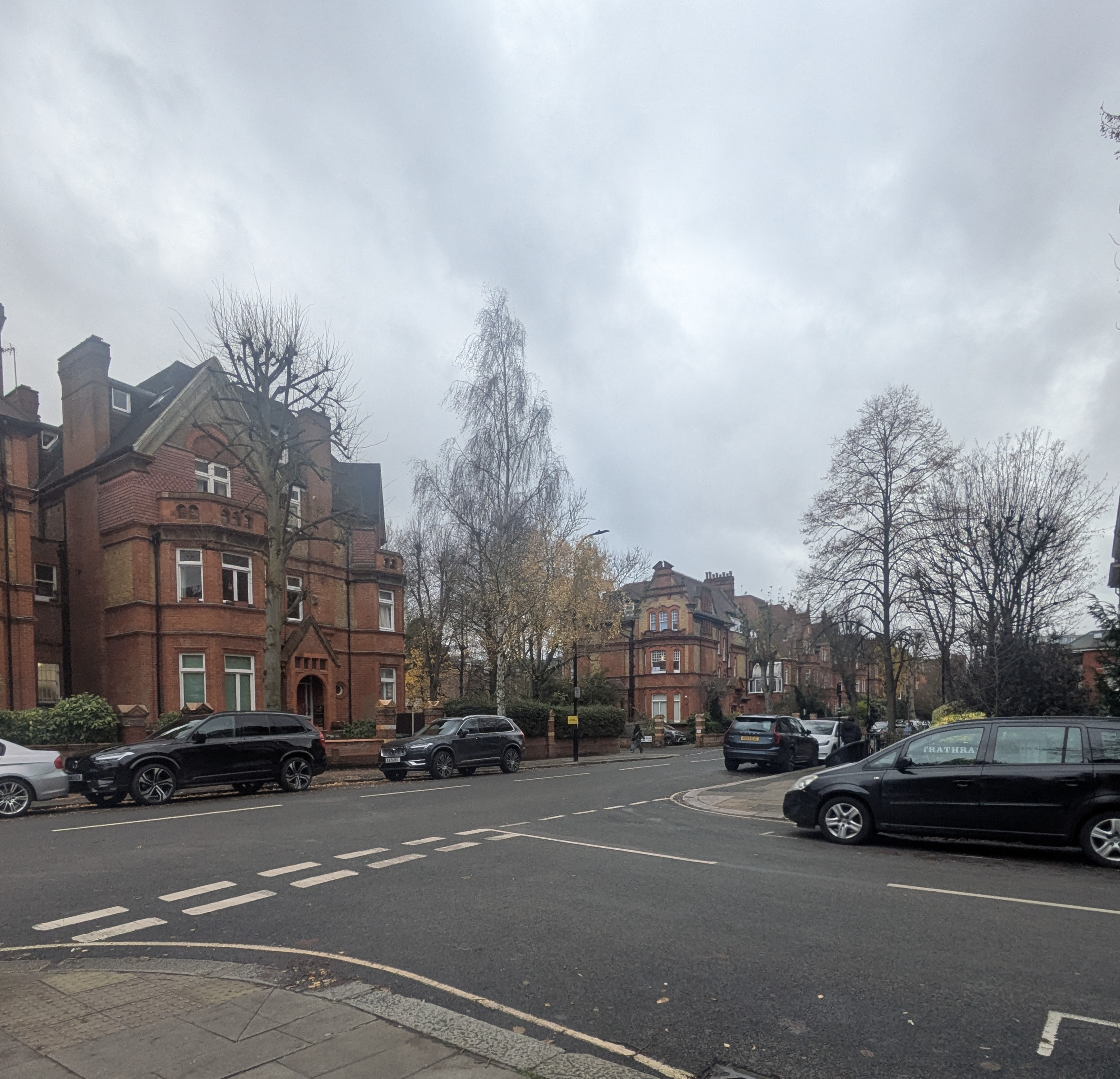 The junction with cars a parked