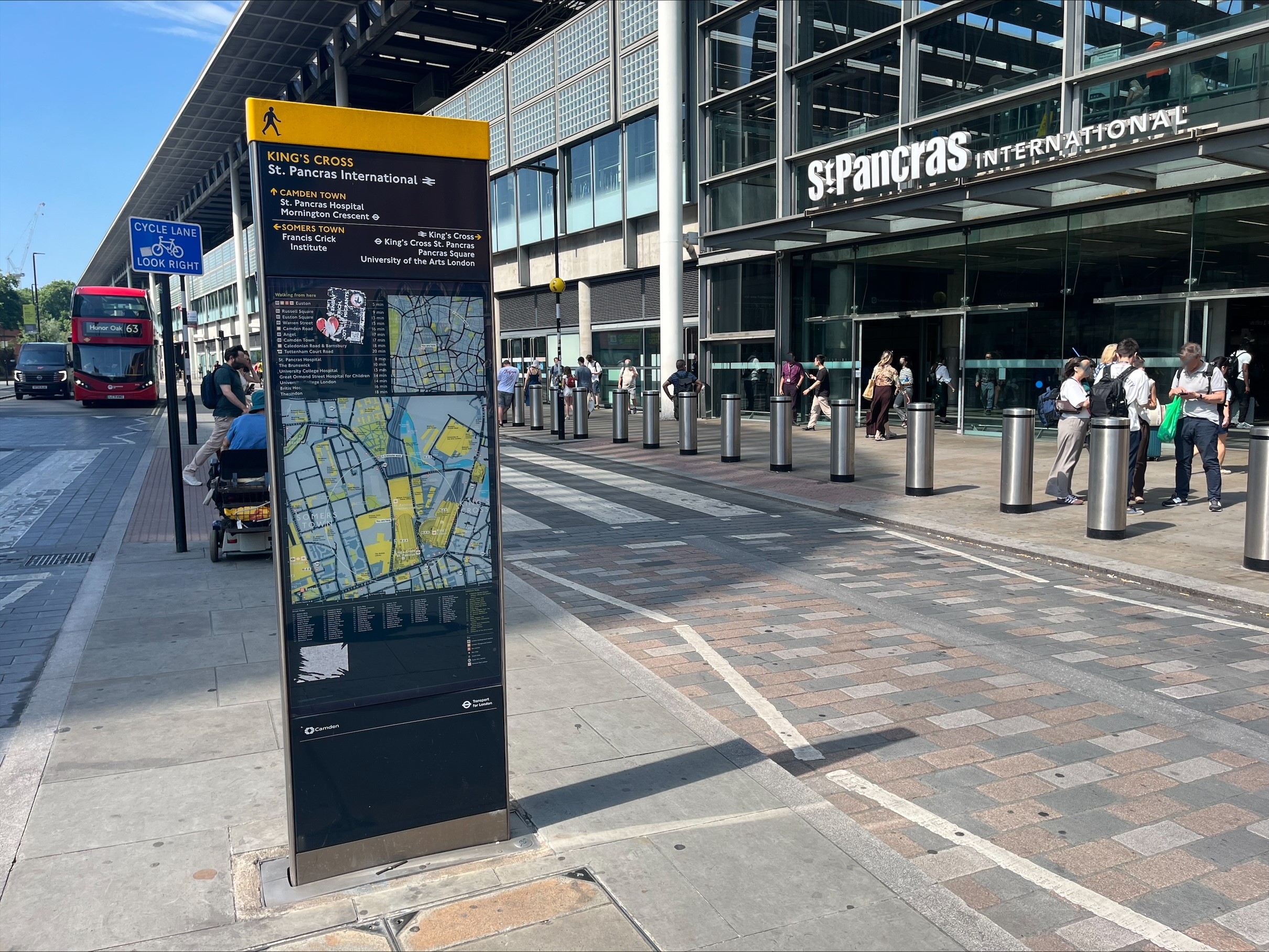 TFL legiable london street sign which has maps and direction text helping people find their way around london