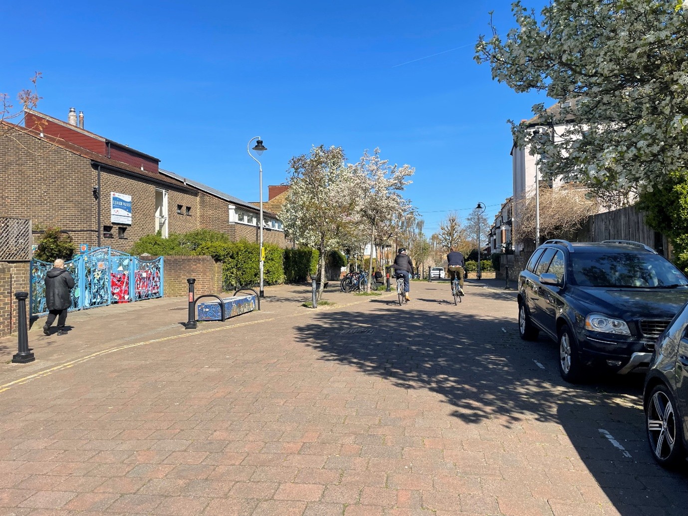 street with two people cycling 