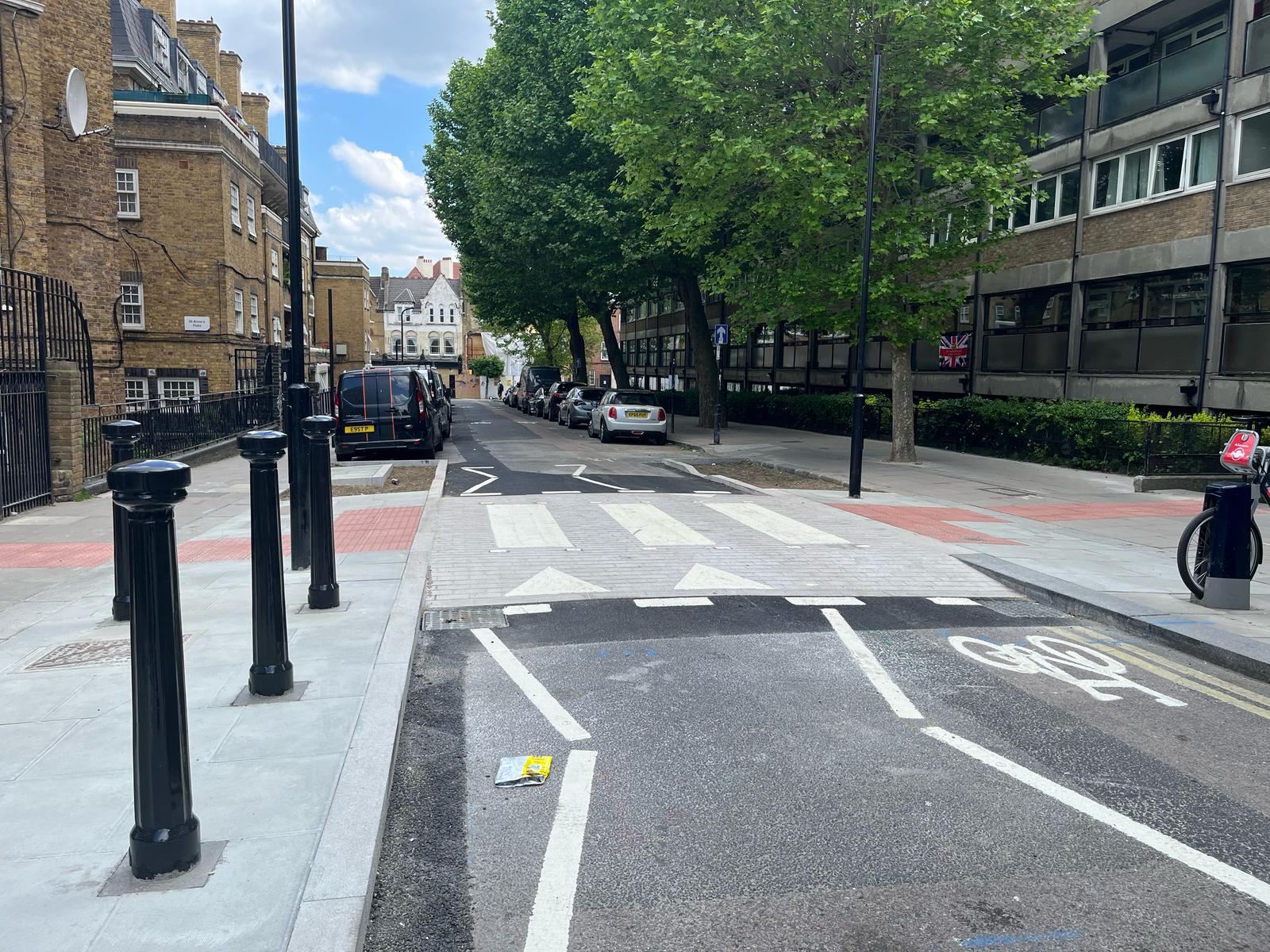 Zebra crossing which is raised up to the same height as the pavement 