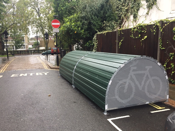 example cycle hangar  - a curved green structure