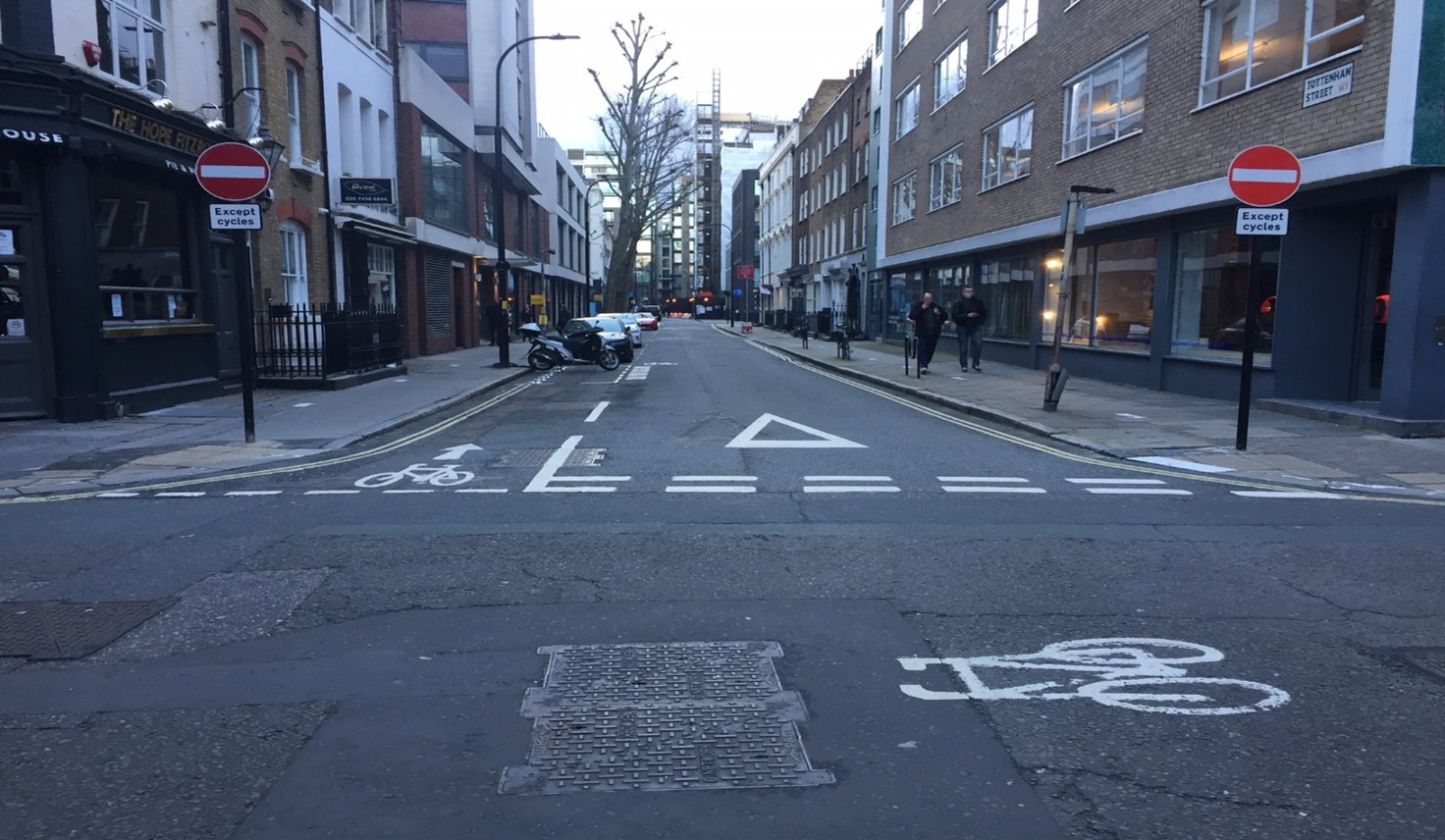 View of Tottenham Street with cycle signs